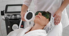 woman getting facial laser treatment