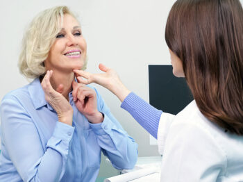 woman getting consultation from a drematologist